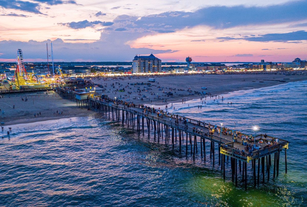 Pier at sunset with carnival lights